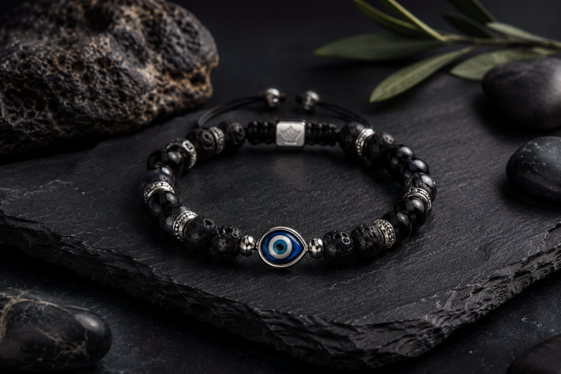 Evil eye 925 silver bracelet with natural stones, handmade Greek mati bracelet on dark stone background.