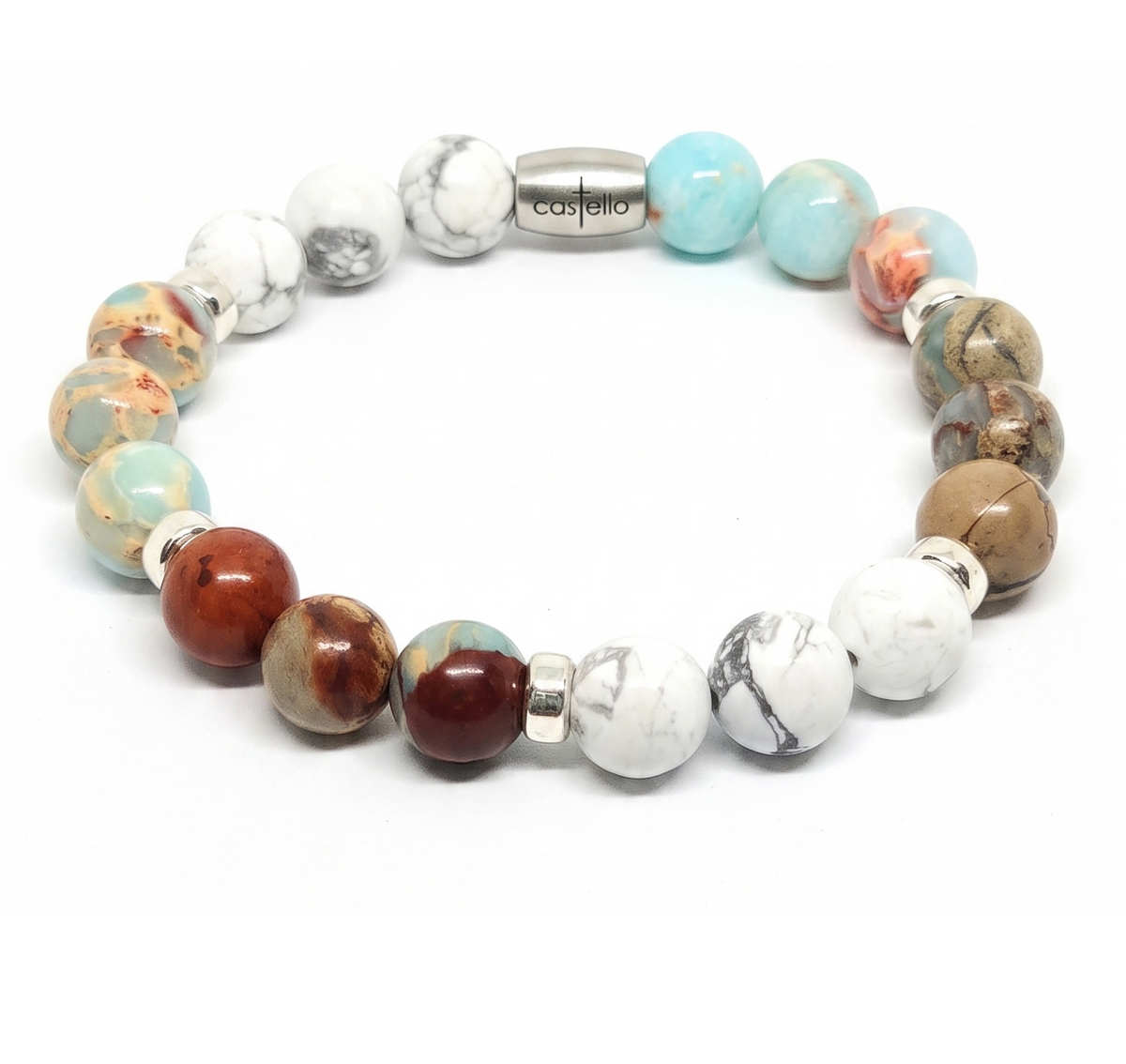 A beaded stretch bracelet by Costallo, featuring a variety of polished stone beads in white marble, turquoise, brown, and reddish-brown, with a central silver metal bead engraved with the brand name.